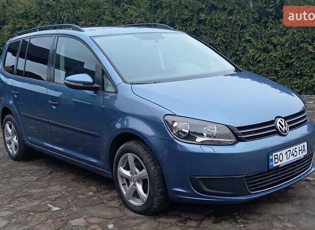 Синий Фольксваген Туран, объемом двигателя 1.2 л и пробегом 160 тыс. км за 7650 $, фото 3 на Automoto.ua