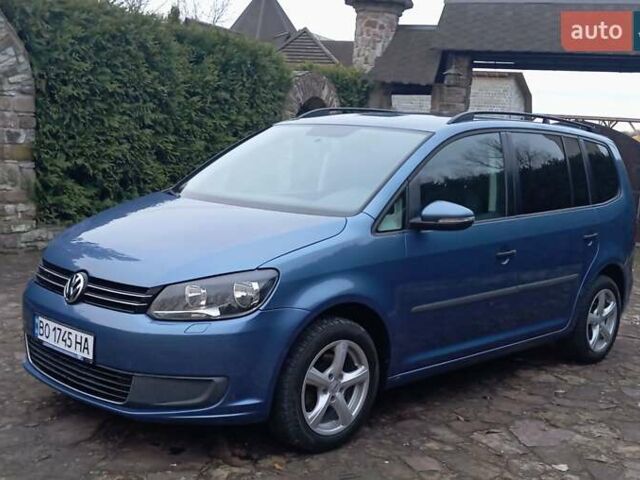 Синий Фольксваген Туран, объемом двигателя 1.2 л и пробегом 160 тыс. км за 7650 $, фото 4 на Automoto.ua
