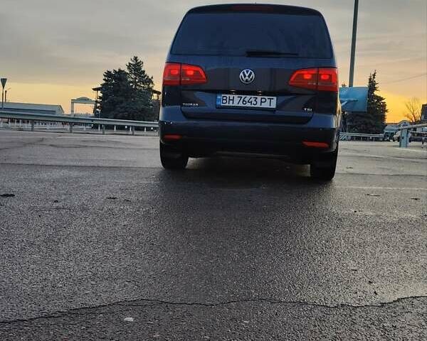 Синий Фольксваген Туран, объемом двигателя 1.4 л и пробегом 154 тыс. км за 10700 $, фото 1 на Automoto.ua