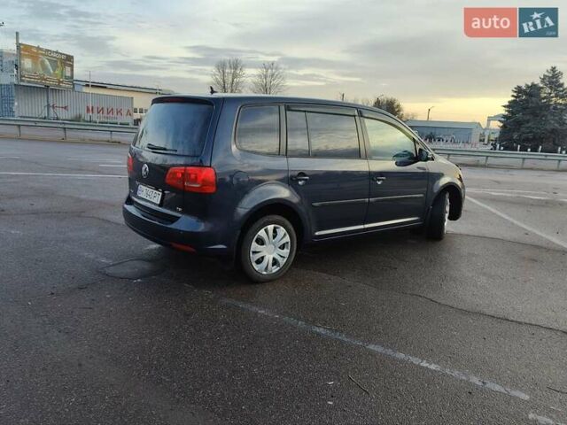 Синий Фольксваген Туран, объемом двигателя 1.4 л и пробегом 154 тыс. км за 10700 $, фото 2 на Automoto.ua