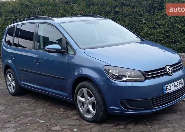 Синий Фольксваген Туран, объемом двигателя 1.2 л и пробегом 160 тыс. км за 7650 $, фото 1 на Automoto.ua