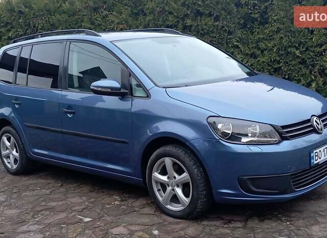 Синий Фольксваген Туран, объемом двигателя 1.2 л и пробегом 160 тыс. км за 7650 $, фото 2 на Automoto.ua