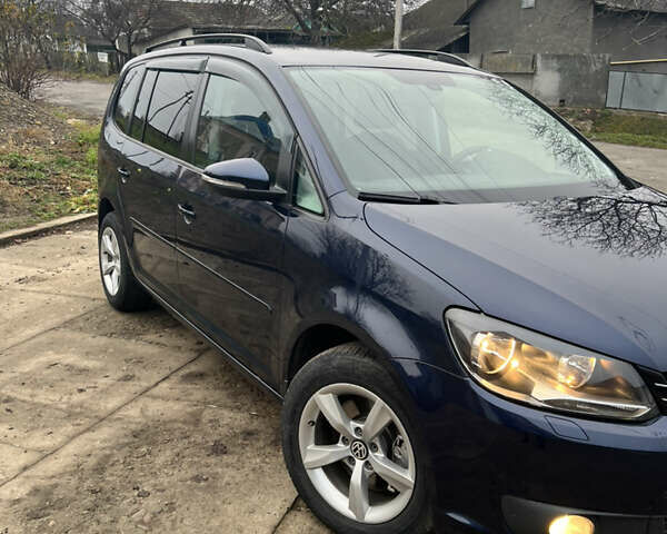 Синій Фольксваген Туран, об'ємом двигуна 1.97 л та пробігом 280 тис. км за 12200 $, фото 1 на Automoto.ua