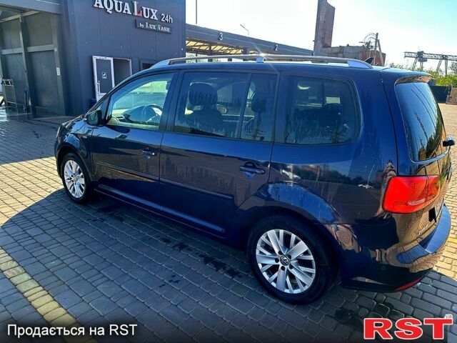 Синий Фольксваген Туран, объемом двигателя 1.6 л и пробегом 209 тыс. км за 11500 $, фото 2 на Automoto.ua