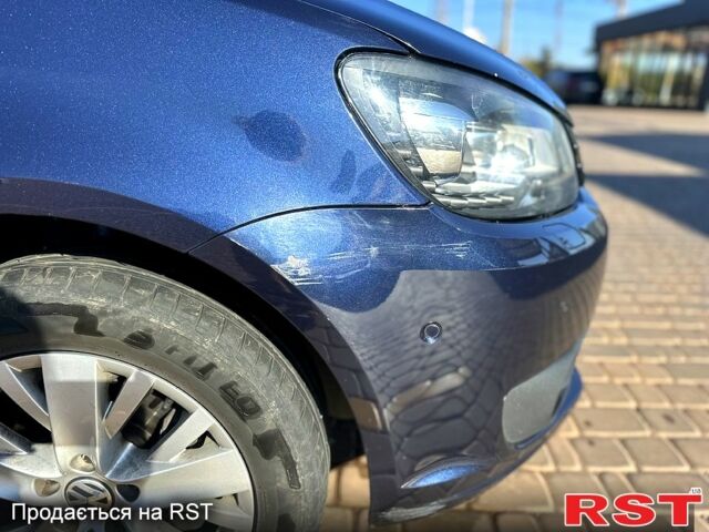 Синий Фольксваген Туран, объемом двигателя 1.6 л и пробегом 209 тыс. км за 11500 $, фото 6 на Automoto.ua