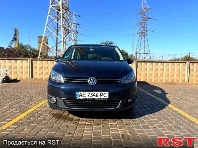 Синий Фольксваген Туран, объемом двигателя 1.6 л и пробегом 209 тыс. км за 11500 $, фото 4 на Automoto.ua