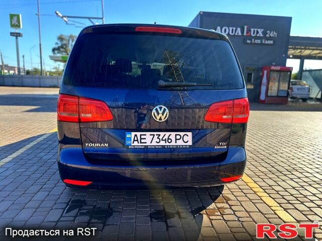 Синий Фольксваген Туран, объемом двигателя 1.6 л и пробегом 209 тыс. км за 11500 $, фото 1 на Automoto.ua