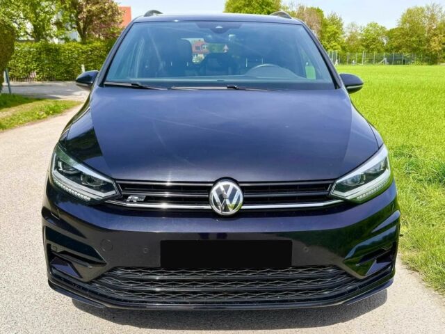 Синій Фольксваген Туран, об'ємом двигуна 2 л та пробігом 33 тис. км за 8400 $, фото 1 на Automoto.ua