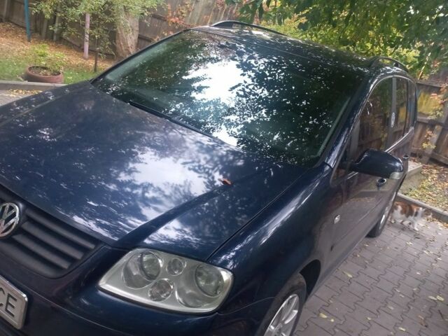 Фольксваген Туран 2005 в Сумах на Automoto.ua Синий Фольксваген Туран, объемом двигателя 1 л и пробегом 250 тыс. км за 6299 $, фото 3 на Automoto.ua