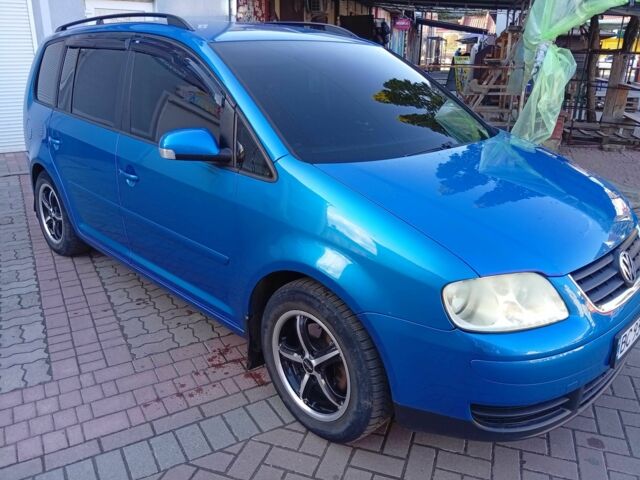 Синий Фольксваген Туран, объемом двигателя 1.6 л и пробегом 229 тыс. км за 5000 $, фото 7 на Automoto.ua