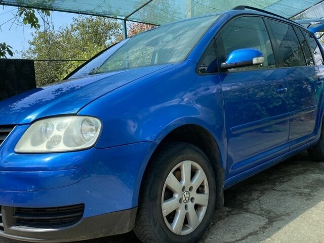 Синий Фольксваген Туран, объемом двигателя 1.6 л и пробегом 270 тыс. км за 5400 $, фото 2 на Automoto.ua