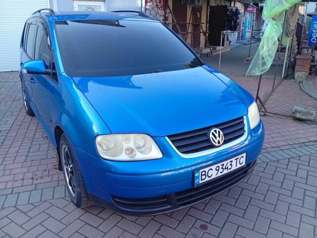 Синий Фольксваген Туран, объемом двигателя 1.6 л и пробегом 229 тыс. км за 5000 $, фото 6 на Automoto.ua