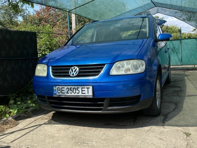 Синий Фольксваген Туран, объемом двигателя 1.6 л и пробегом 270 тыс. км за 5400 $, фото 1 на Automoto.ua
