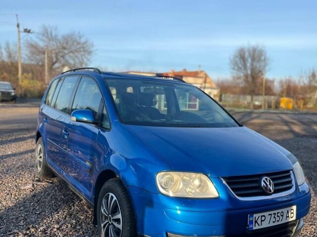 Синий Фольксваген Туран, объемом двигателя 2 л и пробегом 276 тыс. км за 5500 $, фото 2 на Automoto.ua