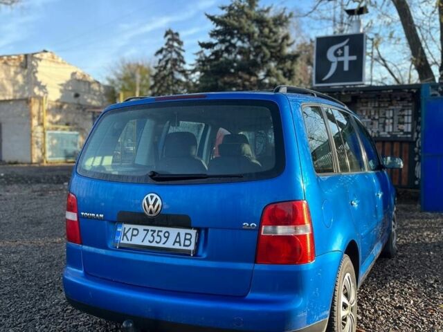 Синий Фольксваген Туран, объемом двигателя 2 л и пробегом 276 тыс. км за 5500 $, фото 1 на Automoto.ua