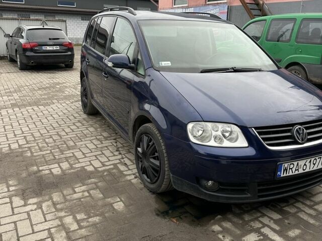 Синий Фольксваген Туран, объемом двигателя 2 л и пробегом 380 тыс. км за 1800 $, фото 1 на Automoto.ua