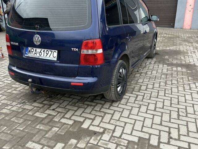 Синий Фольксваген Туран, объемом двигателя 2 л и пробегом 380 тыс. км за 1800 $, фото 2 на Automoto.ua