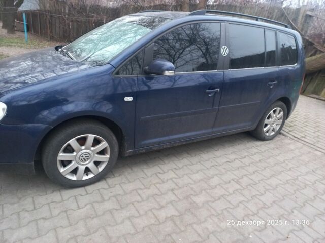 Синій Фольксваген Туран, об'ємом двигуна 1.6 л та пробігом 230 тис. км за 6099 $, фото 6 на Automoto.ua