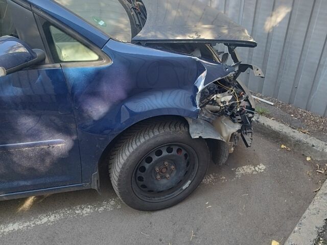 Синий Фольксваген Туран, объемом двигателя 1.4 л и пробегом 230 тыс. км за 3500 $, фото 2 на Automoto.ua