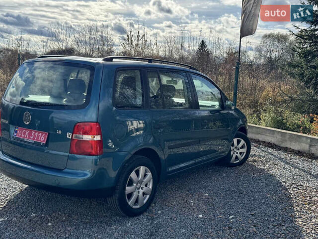 Зеленый Фольксваген Туран, объемом двигателя 1.6 л и пробегом 186 тыс. км за 5150 $, фото 42 на Automoto.ua