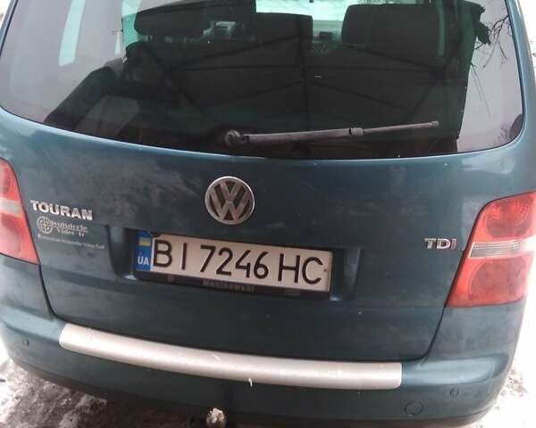 Зеленый Фольксваген Туран, объемом двигателя 1.9 л и пробегом 328 тыс. км за 6000 $, фото 7 на Automoto.ua