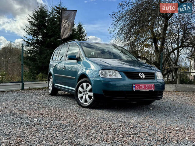 Зеленый Фольксваген Туран, объемом двигателя 1.6 л и пробегом 186 тыс. км за 5150 $, фото 1 на Automoto.ua