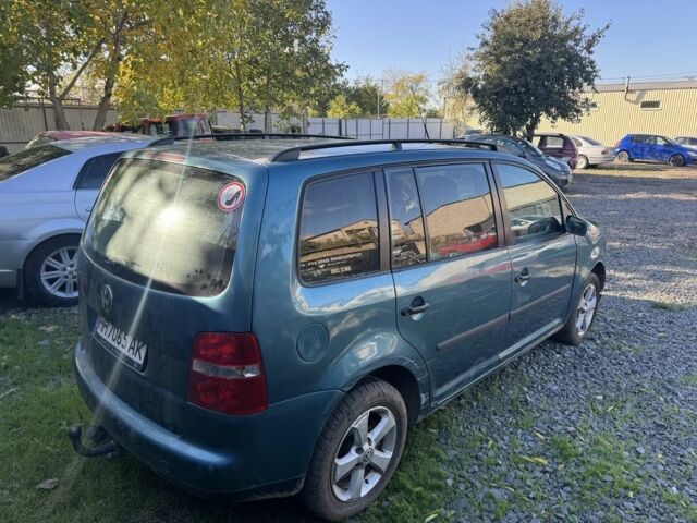 Зеленый Фольксваген Туран, объемом двигателя 1.9 л и пробегом 230 тыс. км за 1950 $, фото 1 на Automoto.ua