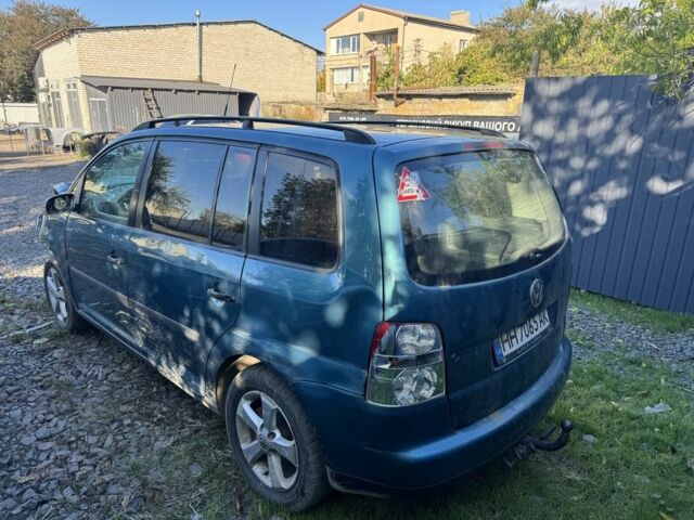 Зеленый Фольксваген Туран, объемом двигателя 1.9 л и пробегом 230 тыс. км за 1950 $, фото 2 на Automoto.ua