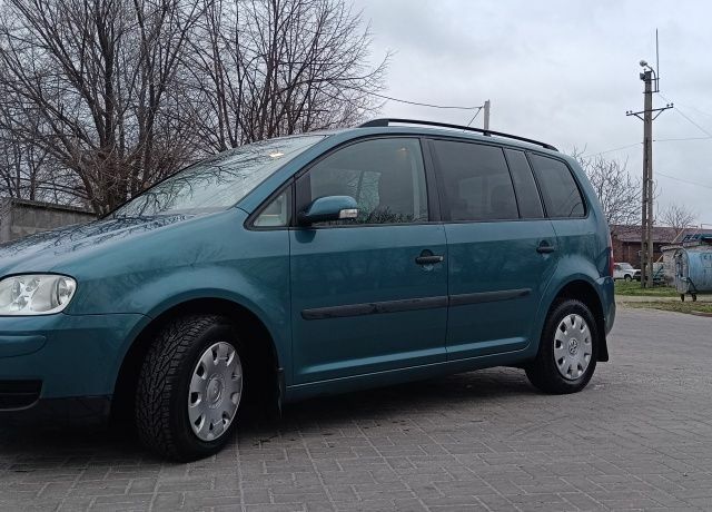 Зеленый Фольксваген Туран, объемом двигателя 1.6 л и пробегом 259 тыс. км за 5500 $, фото 3 на Automoto.ua