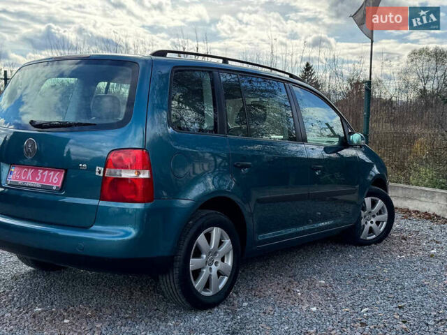 Зеленый Фольксваген Туран, объемом двигателя 1.6 л и пробегом 186 тыс. км за 5150 $, фото 44 на Automoto.ua