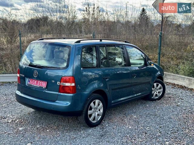 Зеленый Фольксваген Туран, объемом двигателя 1.6 л и пробегом 186 тыс. км за 5150 $, фото 45 на Automoto.ua