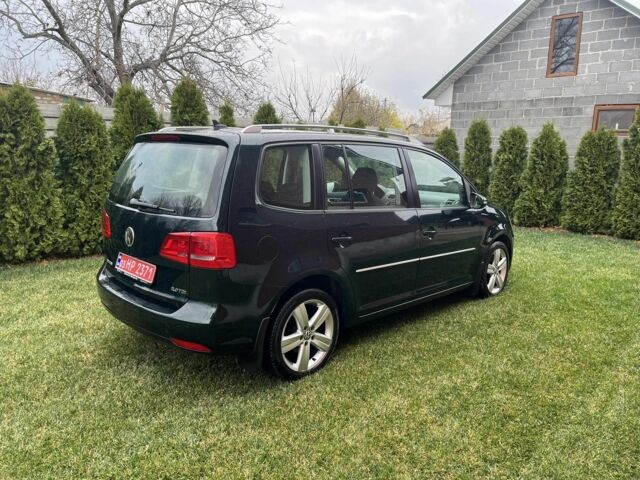 Зеленый Фольксваген Туран, объемом двигателя 2 л и пробегом 282 тыс. км за 10700 $, фото 3 на Automoto.ua