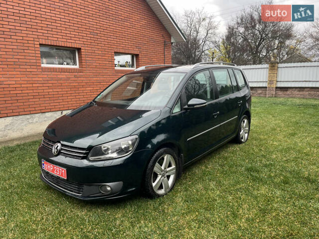 Зеленый Фольксваген Туран, объемом двигателя 2 л и пробегом 282 тыс. км за 10700 $, фото 1 на Automoto.ua