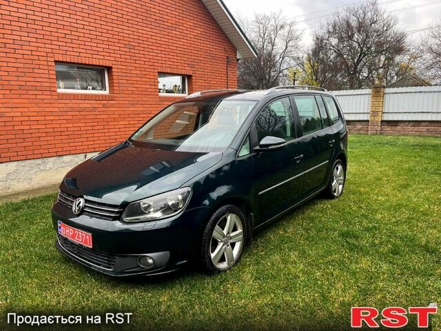 Зеленый Фольксваген Туран, объемом двигателя 2 л и пробегом 282 тыс. км за 10700 $, фото 1 на Automoto.ua