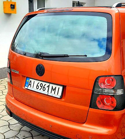 Оранжевый Фольксваген Туран, объемом двигателя 1.4 л и пробегом 217 тыс. км за 6900 $, фото 3 на Automoto.ua