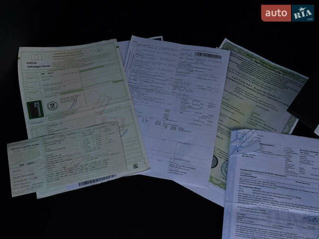 Помаранчевий Фольксваген Туран, об'ємом двигуна 1.4 л та пробігом 211 тис. км за 8450 $, фото 104 на Automoto.ua