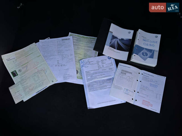 Помаранчевий Фольксваген Туран, об'ємом двигуна 1.4 л та пробігом 211 тис. км за 8450 $, фото 103 на Automoto.ua