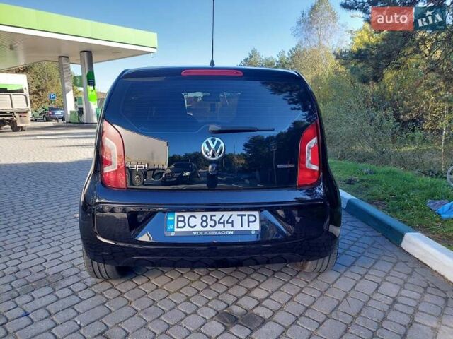 Черный Фольксваген Ап, объемом двигателя 1 л и пробегом 41 тыс. км за 6300 $, фото 1 на Automoto.ua