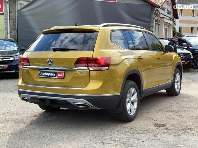 Желтый Фольксваген Atlas, объемом двигателя 3.6 л и пробегом 122 тыс. км за 27290 $, фото 4 на Automoto.ua