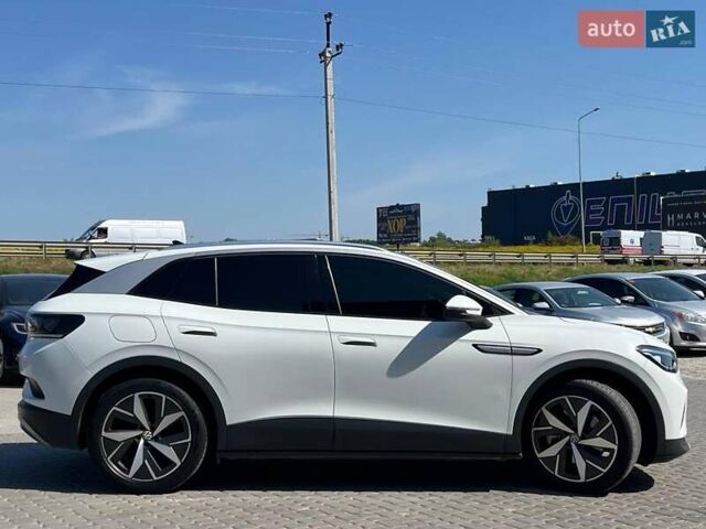 Белый Фольксваген ID.4, объемом двигателя 0 л и пробегом 87 тыс. км за 24790 $, фото 5 на Automoto.ua