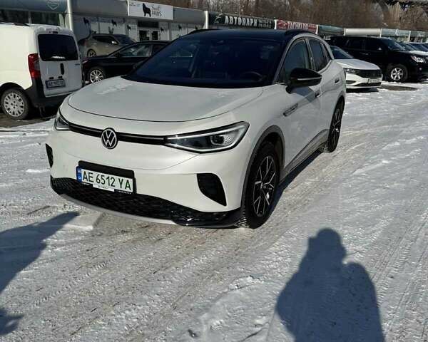 Белый Фольксваген ID.4, объемом двигателя 0 л и пробегом 24 тыс. км за 25500 $, фото 4 на Automoto.ua
