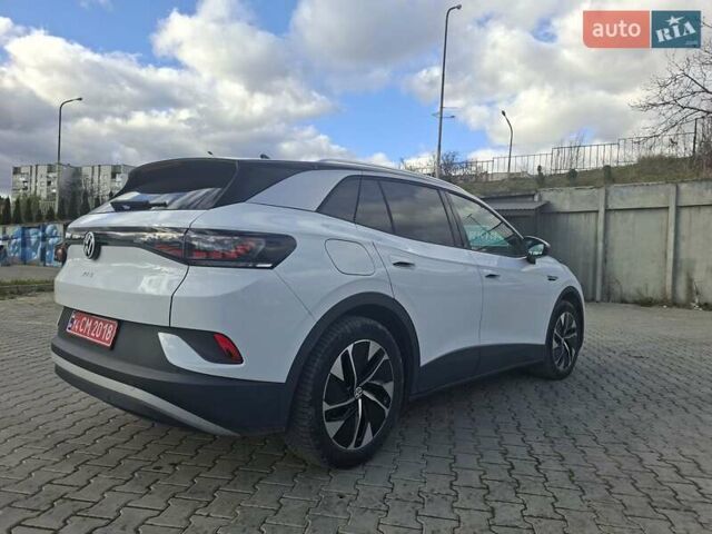 Белый Фольксваген ID.4, объемом двигателя 0 л и пробегом 115 тыс. км за 23100 $, фото 1 на Automoto.ua
