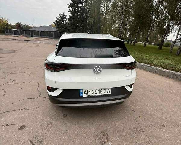 Белый Фольксваген ID.4, объемом двигателя 0 л и пробегом 95 тыс. км за 22999 $, фото 1 на Automoto.ua