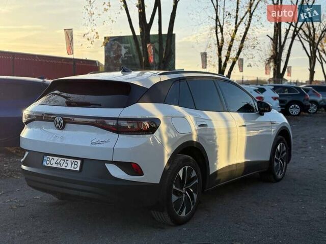 Белый Фольксваген ID.4, объемом двигателя 0 л и пробегом 92 тыс. км за 29000 $, фото 4 на Automoto.ua