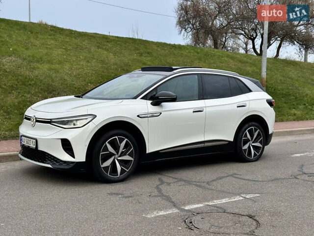 Белый Фольксваген ID.4, объемом двигателя 0 л и пробегом 65 тыс. км за 22999 $, фото 4 на Automoto.ua