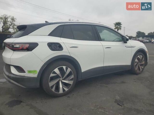 Белый Фольксваген ID.4, объемом двигателя 0 л и пробегом 63 тыс. км за 10700 $, фото 2 на Automoto.ua