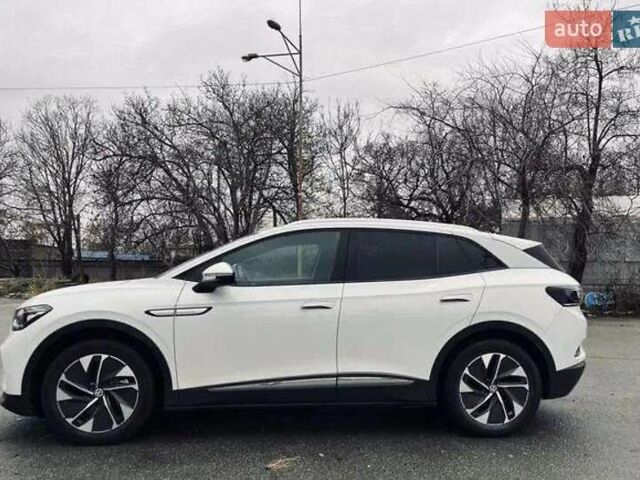 Белый Фольксваген ID.4, объемом двигателя 0 л и пробегом 19 тыс. км за 23500 $, фото 3 на Automoto.ua