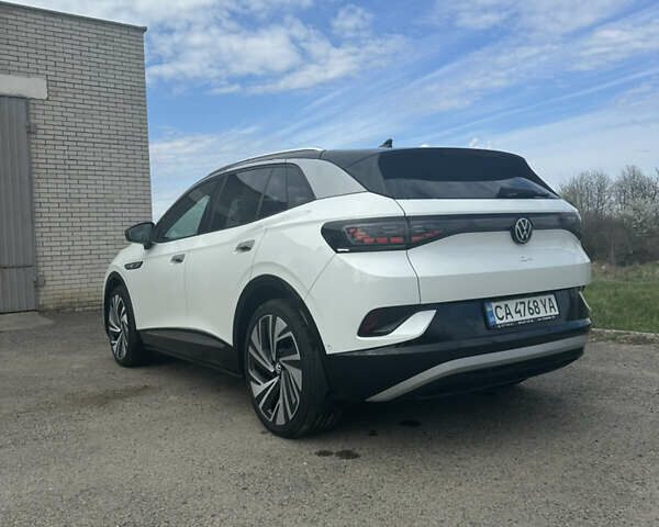 Белый Фольксваген ID.4, объемом двигателя 0 л и пробегом 56 тыс. км за 28500 $, фото 2 на Automoto.ua