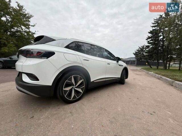 Белый Фольксваген ID.4, объемом двигателя 0 л и пробегом 95 тыс. км за 22999 $, фото 2 на Automoto.ua