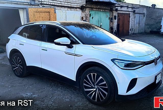 Белый Фольксваген ID.4, объемом двигателя 0 л и пробегом 32 тыс. км за 22000 $, фото 1 на Automoto.ua